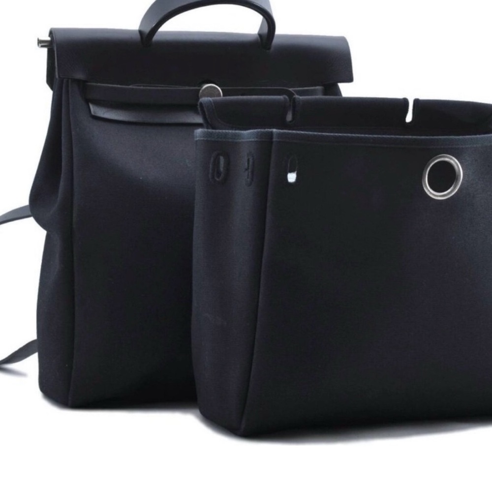 Elegant authentic Black HERMÈS Her Bag Ado 2 in 1 handbag and backpack Canavas.